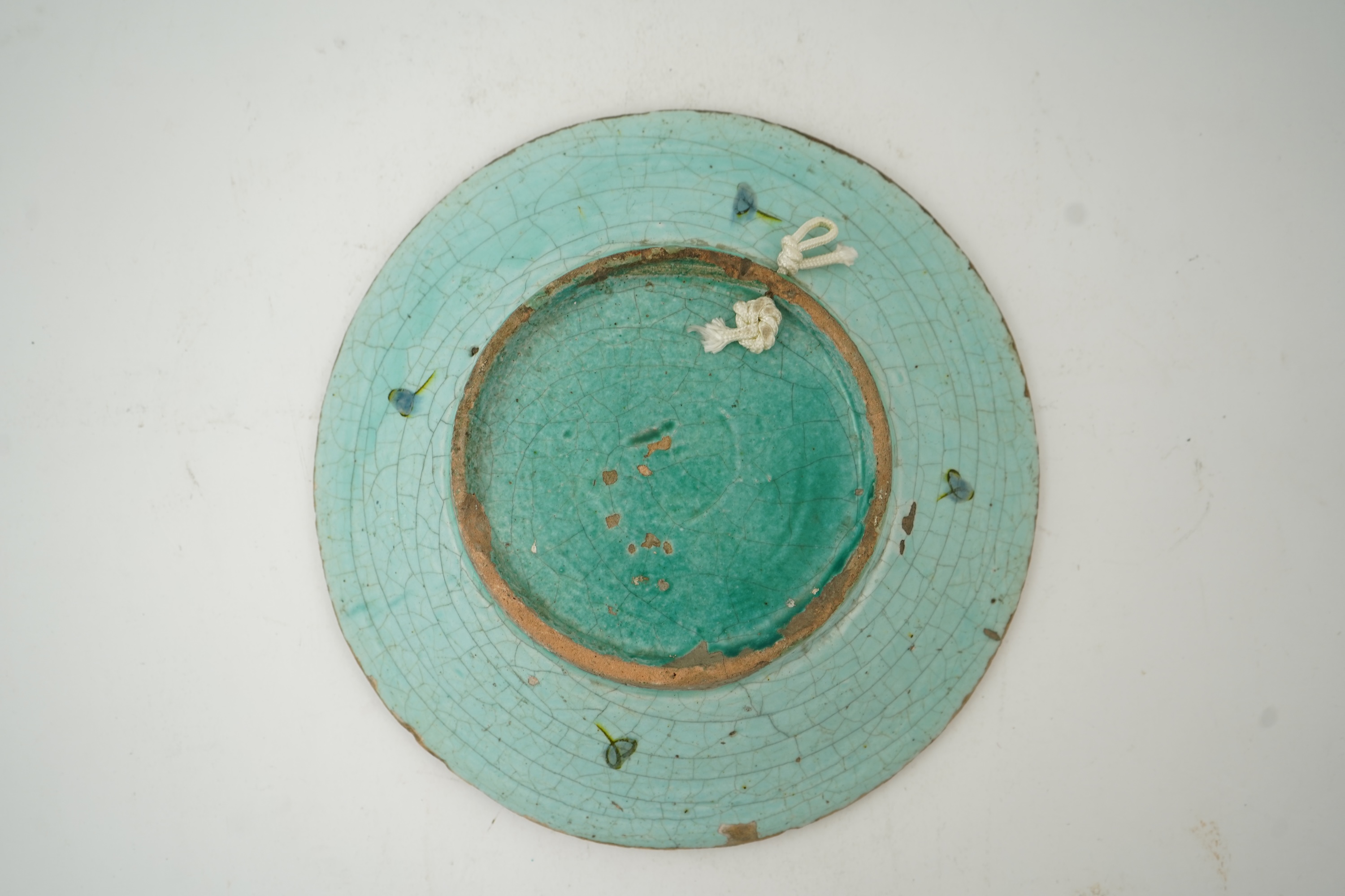 An Iznik pottery turquoise glazed dish, Ottoman Turkey, c.1650-1700